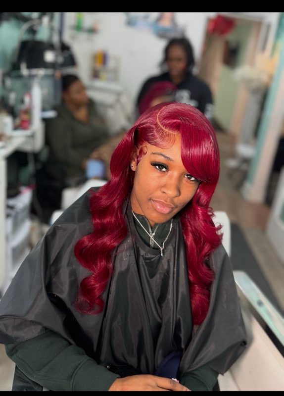Long red waves with a swoop bang