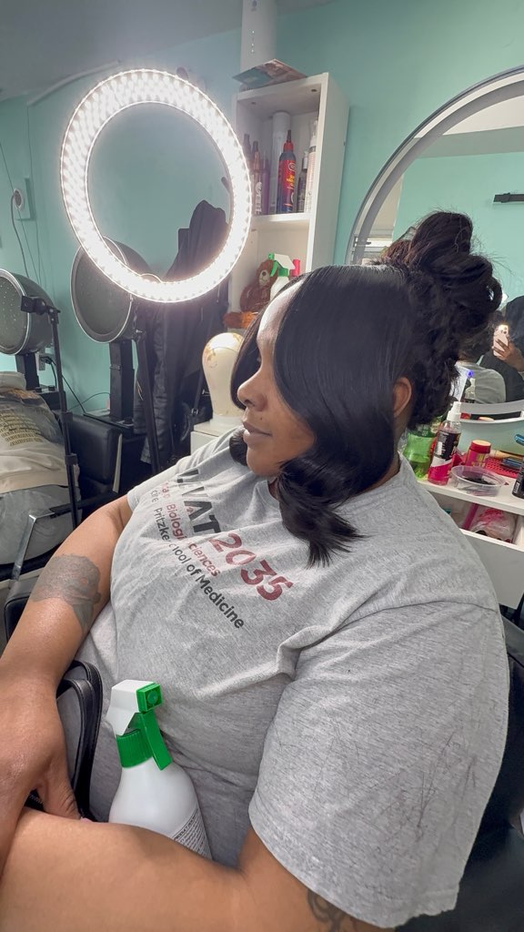Updo with a side-swept bang
